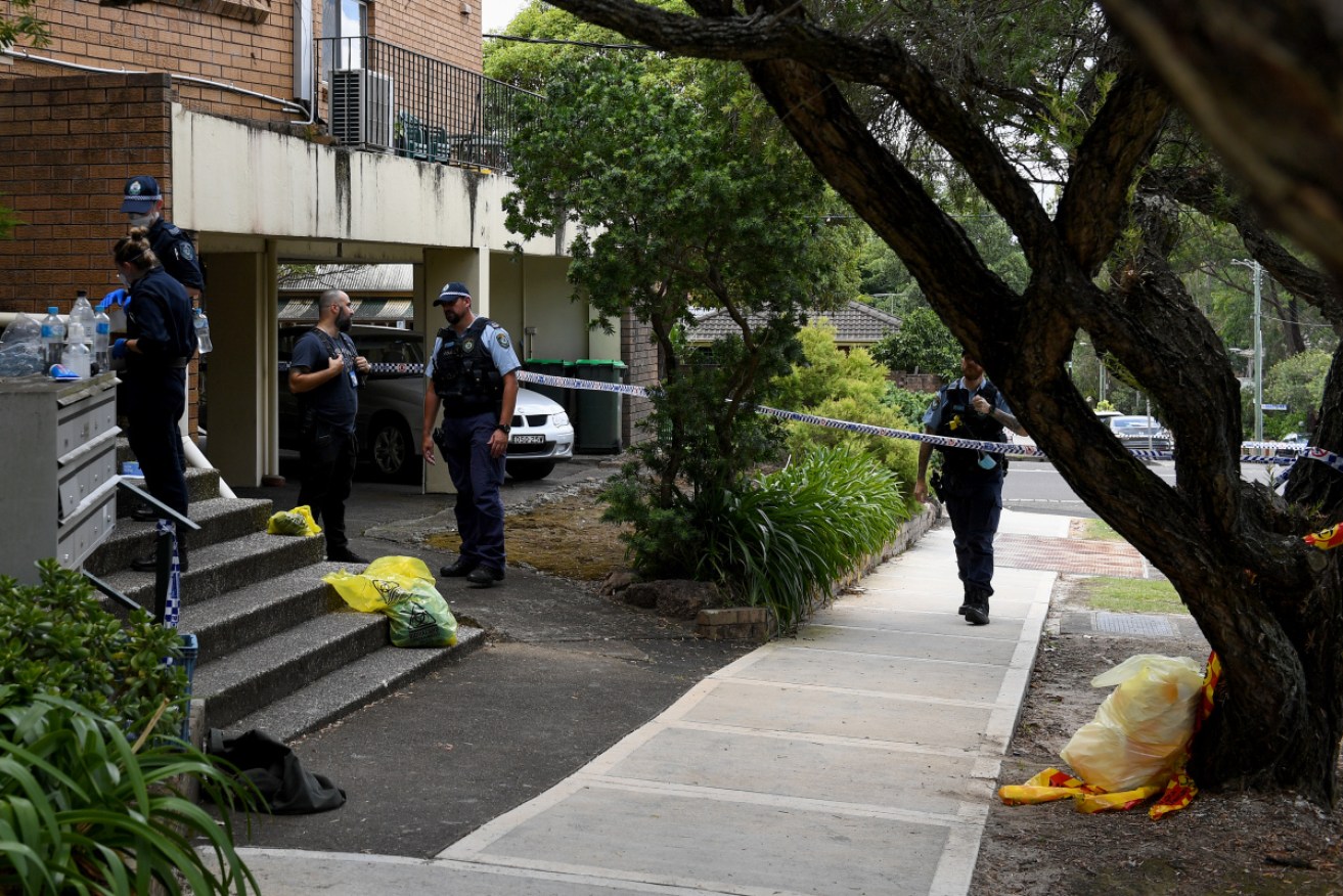 A 20-year-old man is in police custody after a woman's body was found at a unit in Sydney's west. 