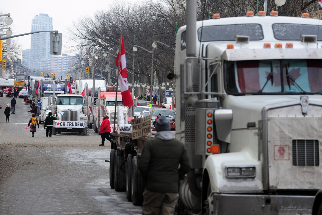 Mr Trudeau's diagnosis came as a convoy of anti-vaccine truckers has blocked the Canadian capital.