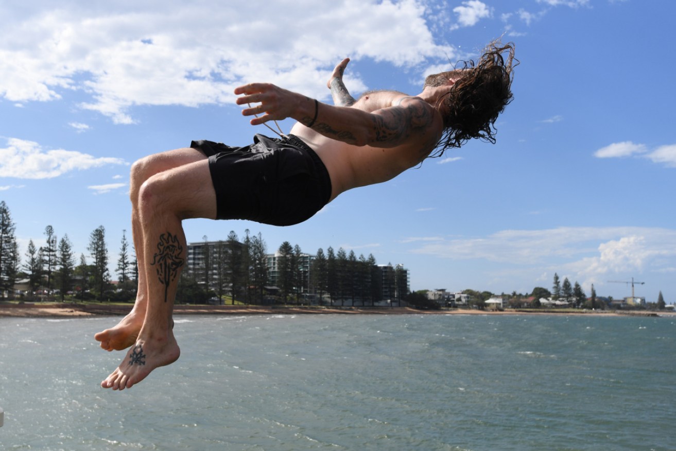 Queensland is experiencing some power blackouts as a heatwave puts the grid under extreme pressure.