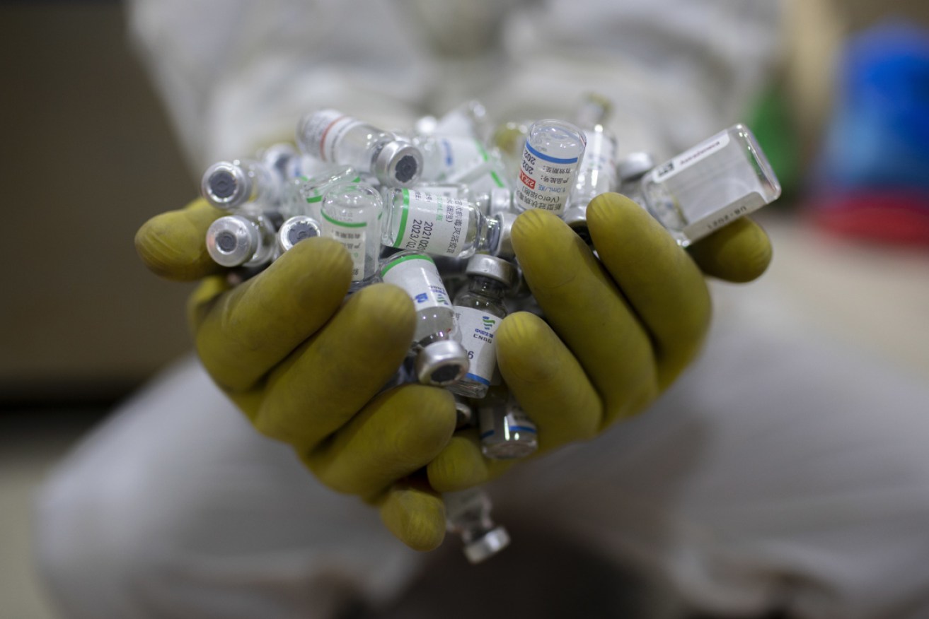 The COVID-19 pandemic has created tens of thousands of tonnes of medical waste, a WHO report says. 