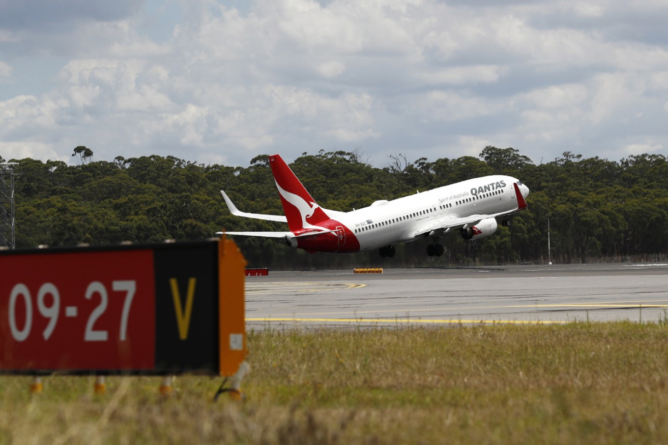 Qantas is being accused of using EBA negotiations to force flight attendants on to lower wages. 
