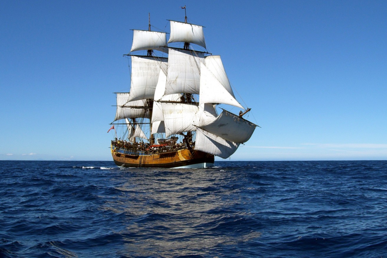 An Australian-built replica of the Endeavour is moored at Darling Harbour.