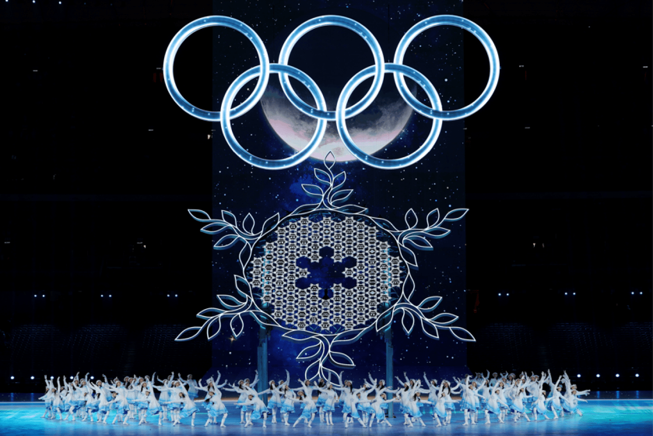 A giant snowflake cauldron under the frozen Olympic rings. Photo: Getty