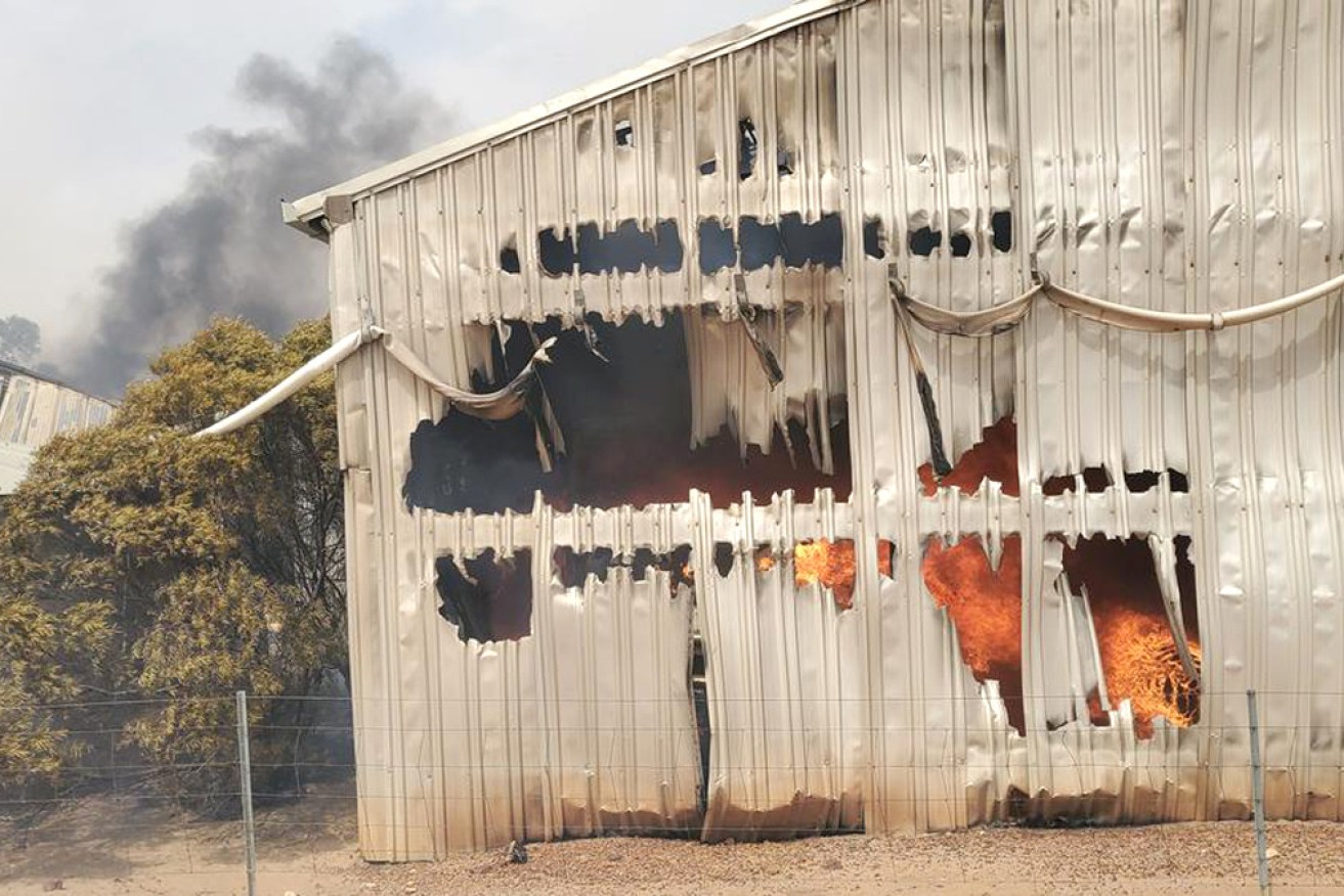 Farmer Ashley Jacobs said his farm had burned and he lost sheds and machinery on a "disastrous" day.