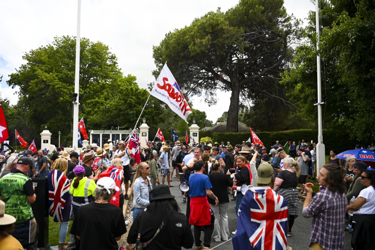 Protesters outside Government House in Canberra on Monday.