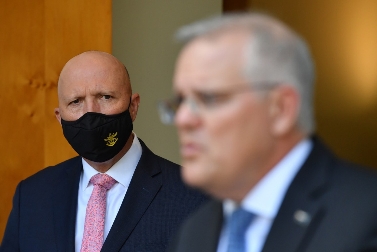 Defence Minister Peter Dutton is looming large for Scott Morrison.