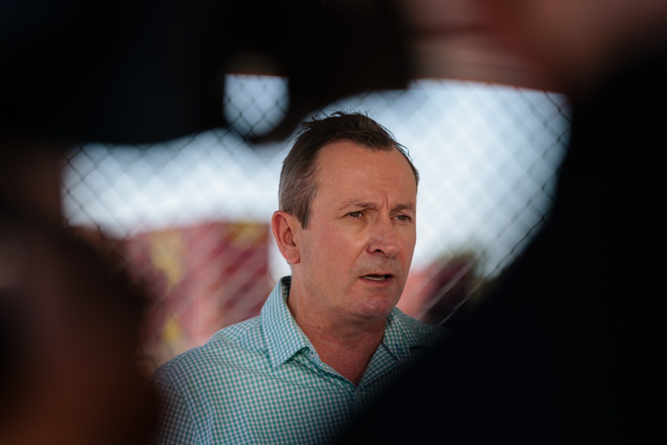 Mark McGowan says WA will halve isolation periods for COVID-infected people and close contacts. 