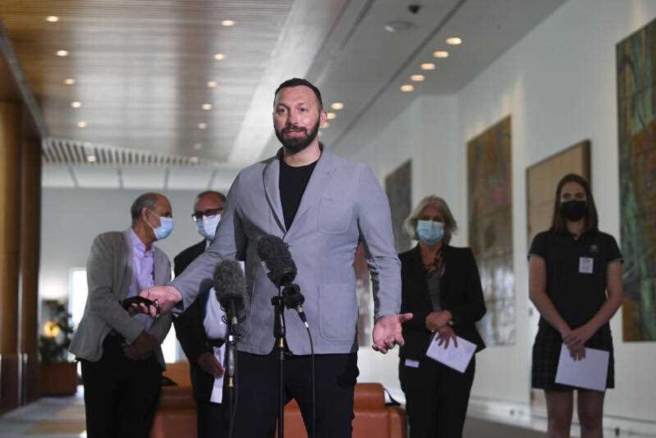 Ian Thorpe with other advocates against the bill at parliament on Tuesday.