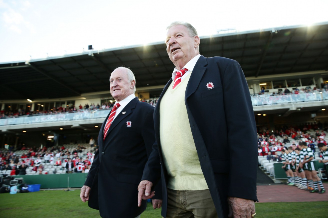 Raper (right) with fellow rugby league legend Graeme Langlands at a Dragons match.