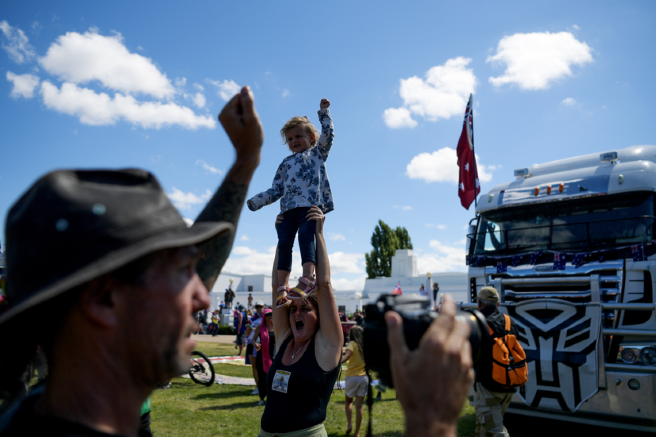 Some protesters brought small children to the anti-mandate rally, despite police pleas to exercise caution and restraint.