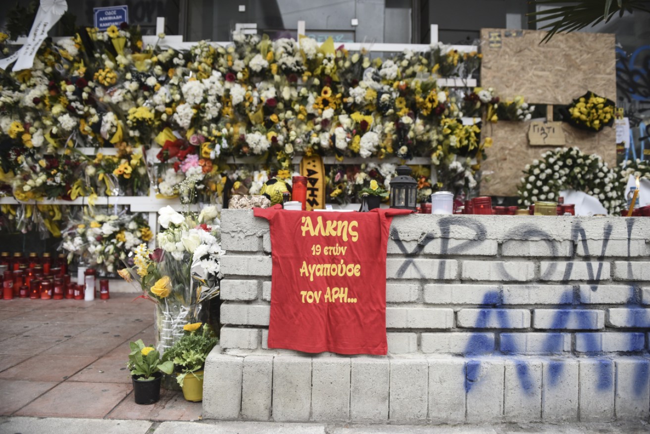 A shrine to Aris fan Alkis Kambanos, whose murder in Thessaloniki has led to a government crackdown.