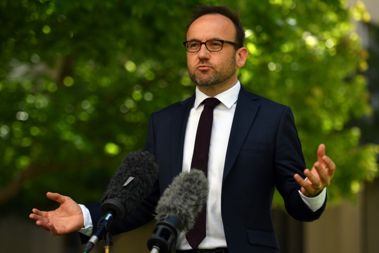 Adam Bandt vows to use his party's post-election clout to ban new coal and gas projects.