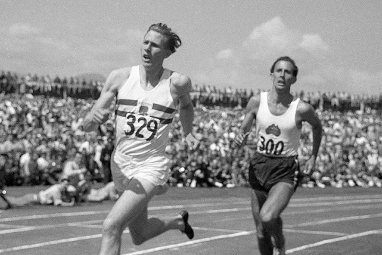 John Landy (r) goes stride-for-stride with Roger Banister at the 1954 Vancouver Commonwealth Games. <i>Photo: CGF</i>