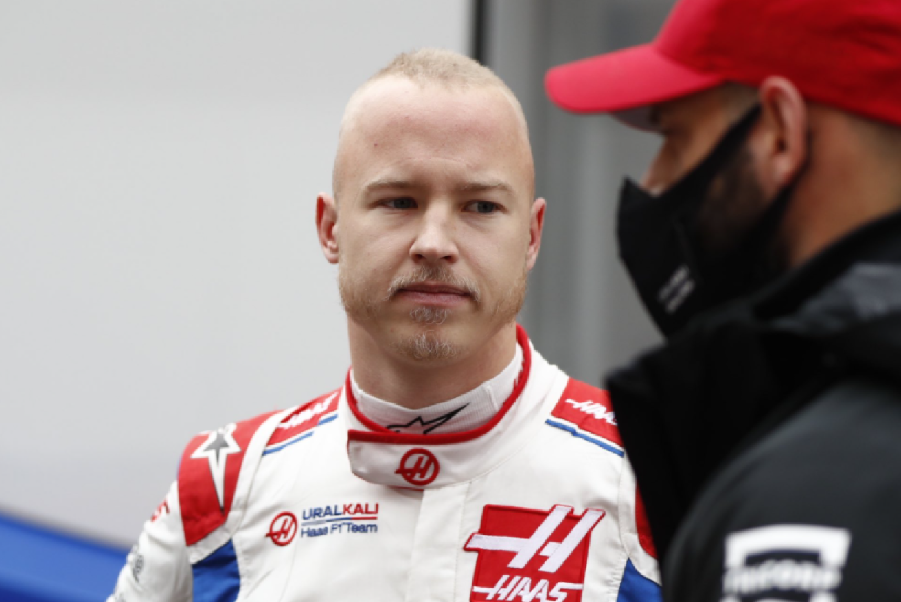 Nikita Mazepin doesn't look too happy at the news he's getting.<i>Photo: Haas Racing</i>