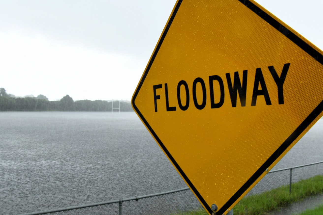 Queensland's Gold Coast remains under flooding threat despite heavy rain starting to ease.