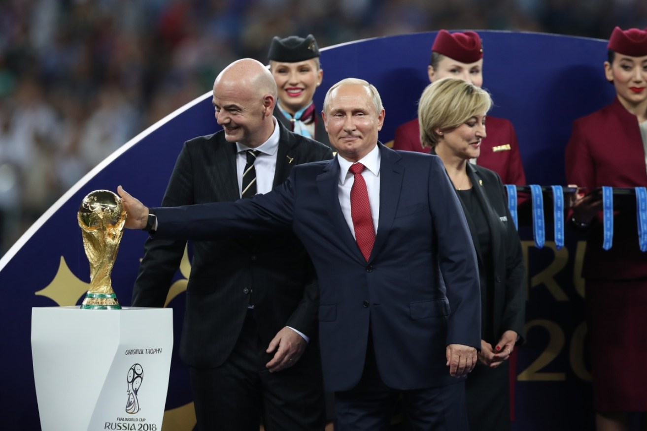 Vladimir Putin with Gianni Infantino, president of FIFA who have cut Russia from the World Cup.