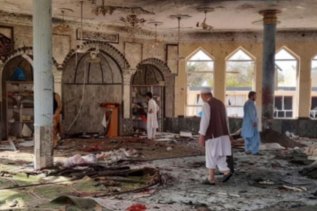 Shaken survivors survey the shocking wreckage of the Pakistani mosque where scores of lives were snuffed out.<i>Photo: Sheharyar Jaffri/Twitter</i>