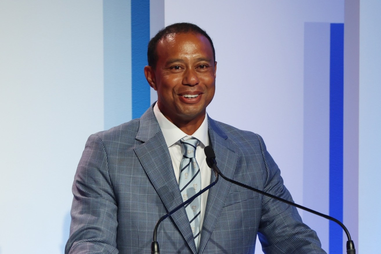 Tiger Woods speaks during his induction into the World Golf Hall of Fame
