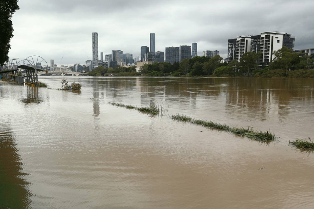 The Brisbane River is still breaking its banks and the flood debris keeps coming. <i>Photo: AAP</i>