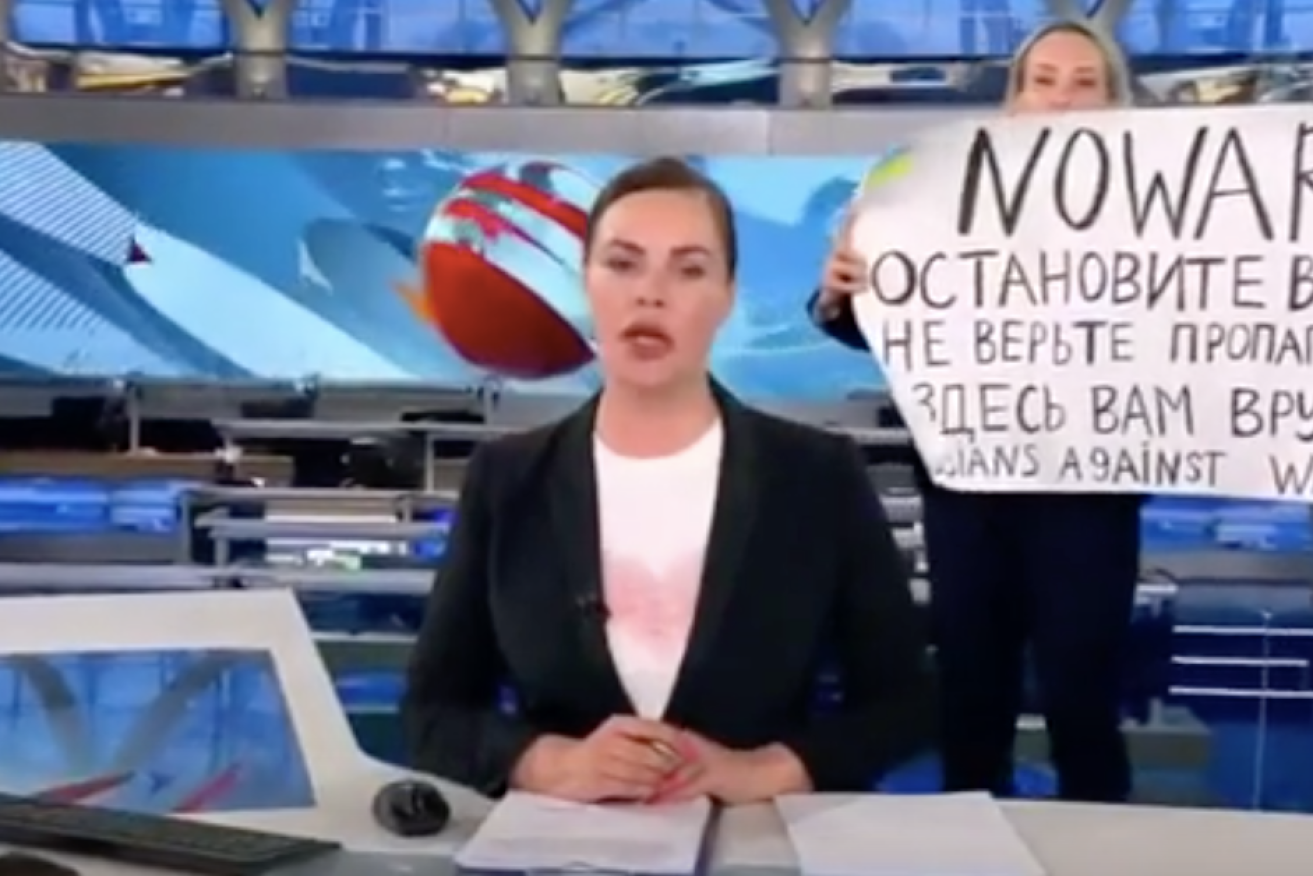 Marina Ovsyannikova appeared behind a TV news presenter with a "Stop the war" sign in March 2022.