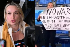 Russian TV employee turns Kremlin protester