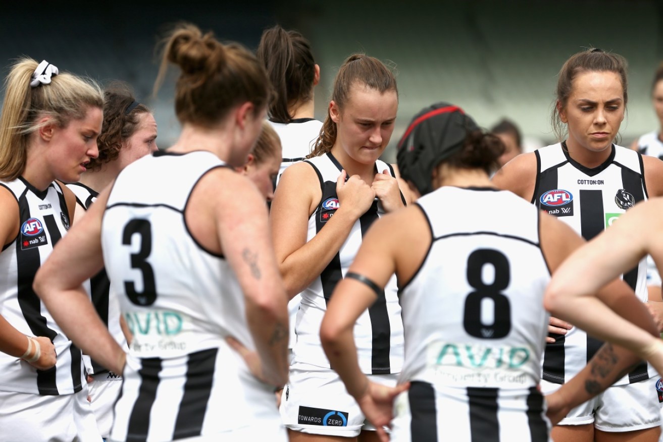 An AFLW final between Collingwood and Brisbane has been postponed because of a COVID-19 outbreak.
