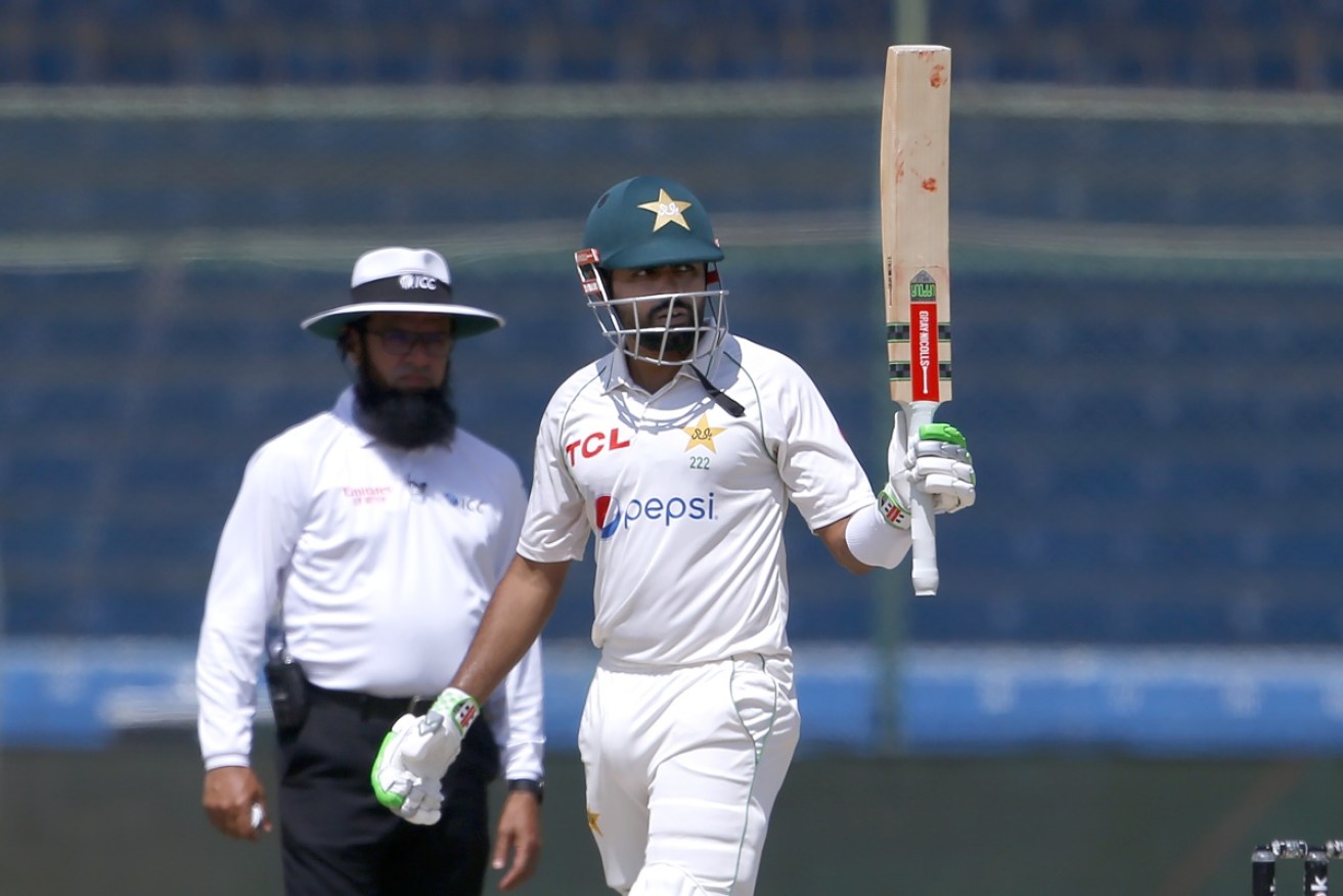 Pakistan's Babar Azam celebrates his 150 in the epic knock that eked out a draw against Australia. 