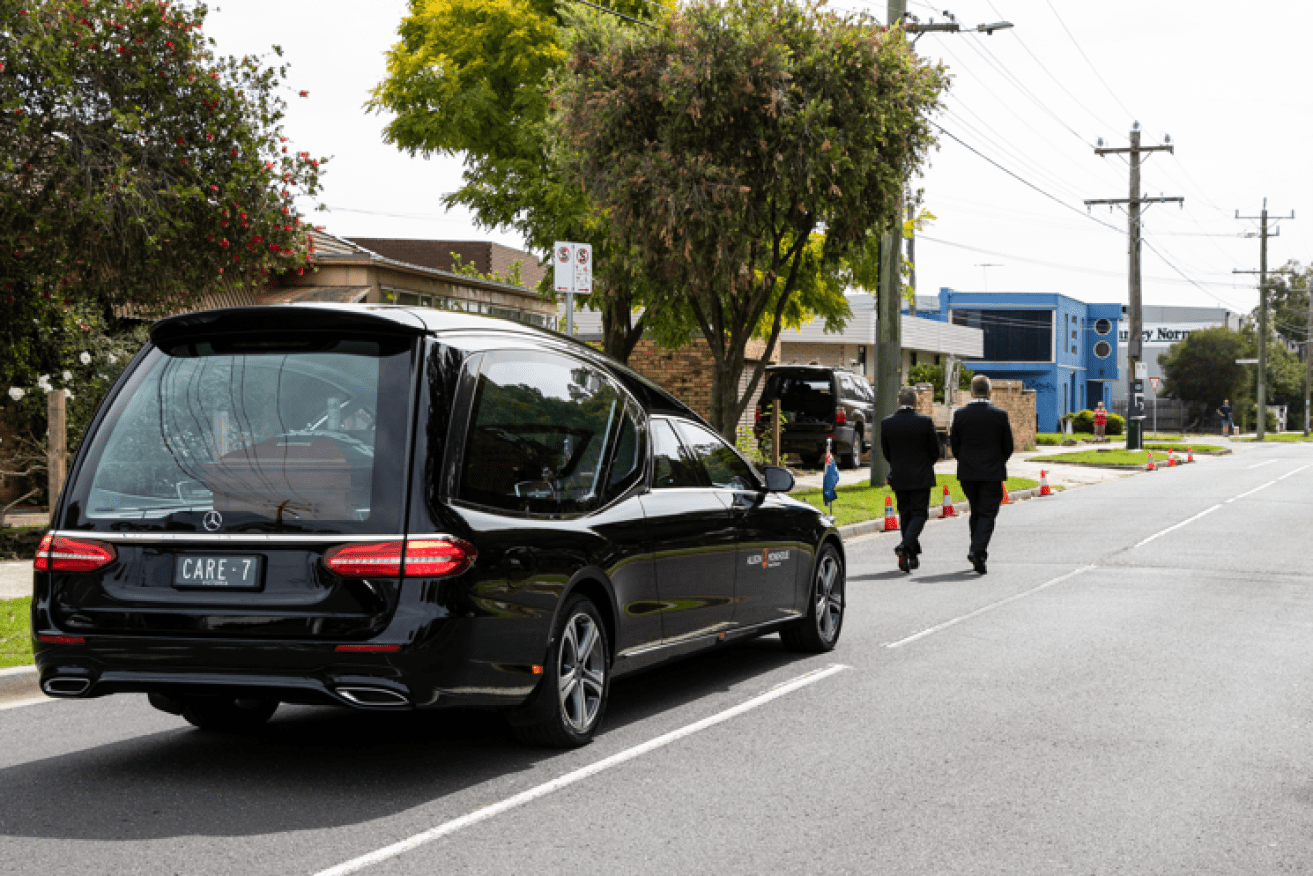Shane Warne's hearse makes its stately journey to the funeral service at the St Kilda Football Club. <i>Photo: AAP</i>