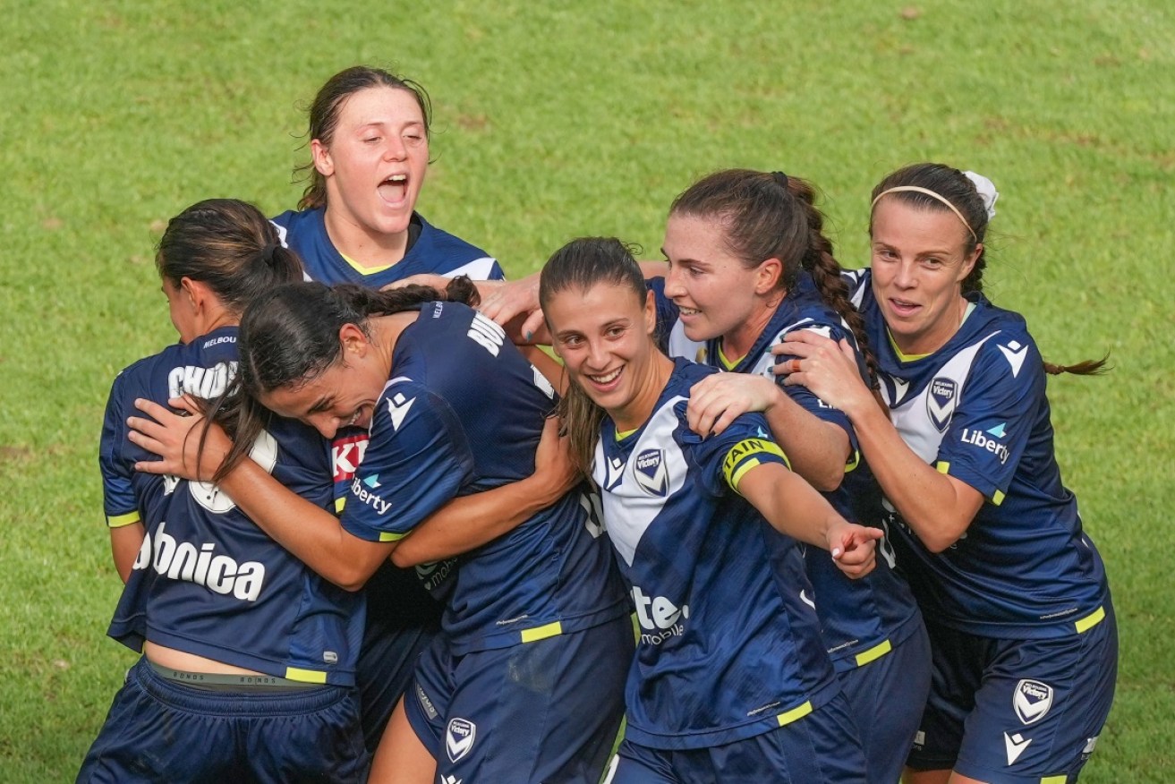 Melbourne Victory teammates revel after advancing on Sunday to the A-League Women grand final.