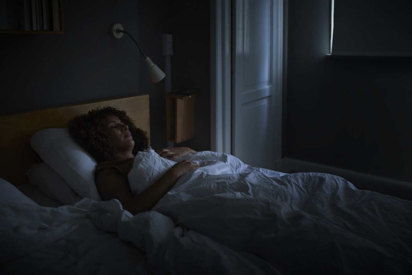 Keeping the TV on at night has long been associated with obesity. A new study tries to explain why.