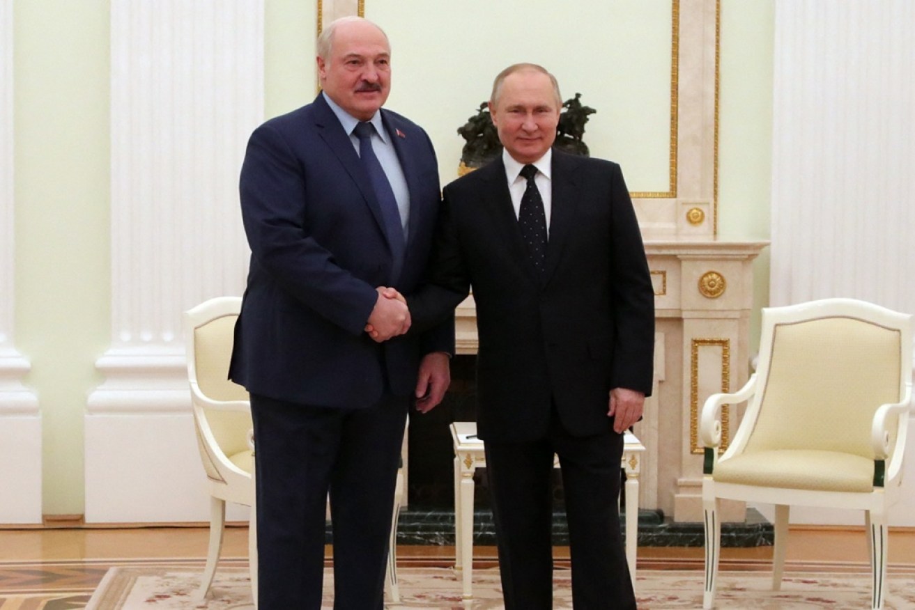 Australia has imposed sanctions on Belarusian President Alexander Lukashenko (left).