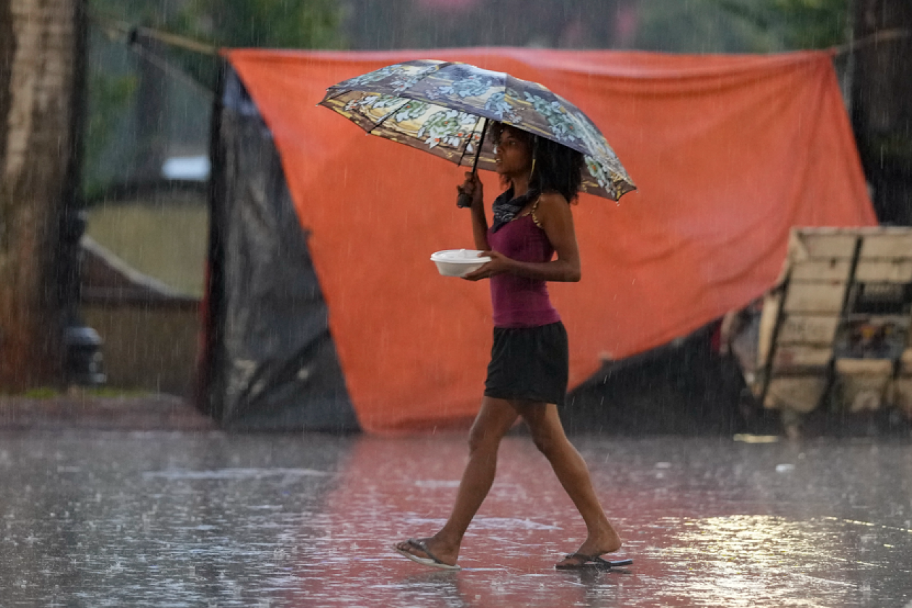 The rain keeps coming in Rio, where makeshift camps house those left homeless by floods and mudslides.<i>Photo: AP</i>