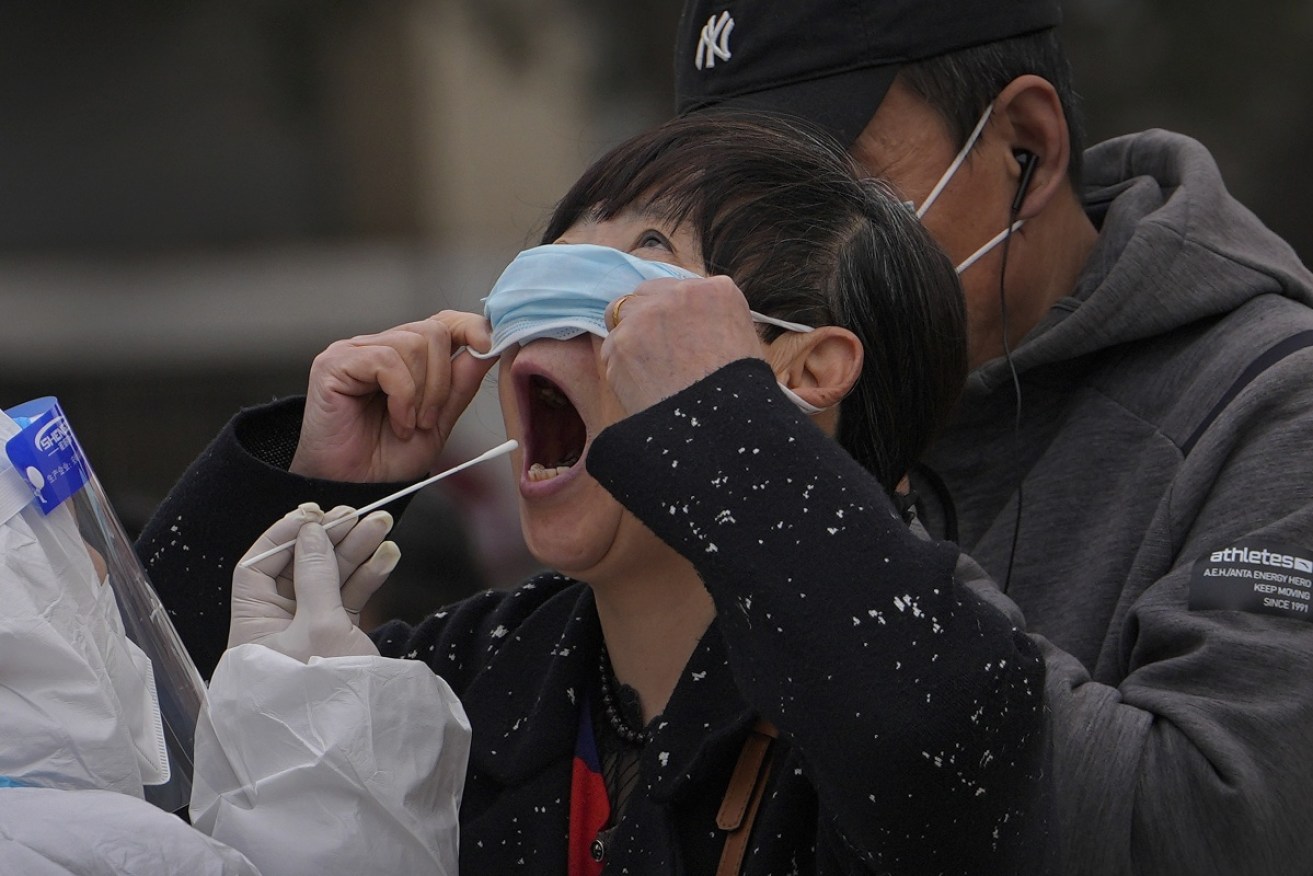 China is sticking to its hard-line "zero-tolerance" approach to the coronavirus. 