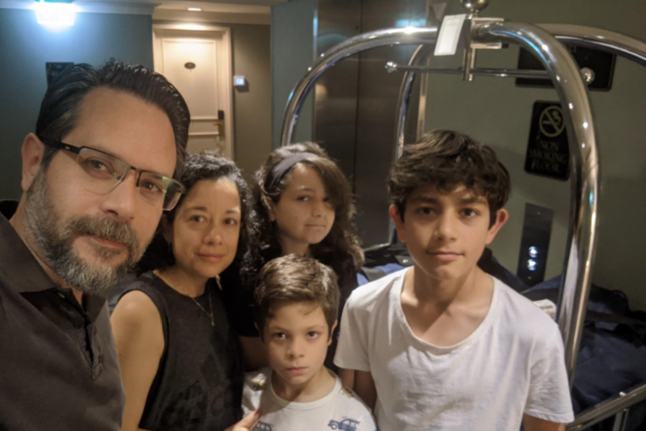 Capurro, Javiera Martinez and their children at a Hotel after domestic flight delays stranded them  in Sydney. <i>photo: AAP</i>