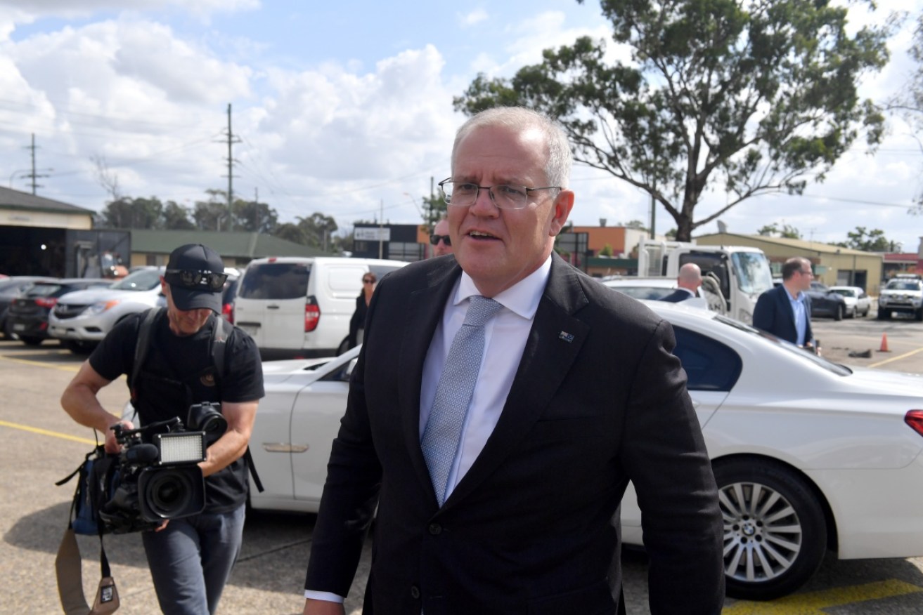Scott Morrison has been confronted by an angry man at a media event in Sydney. 