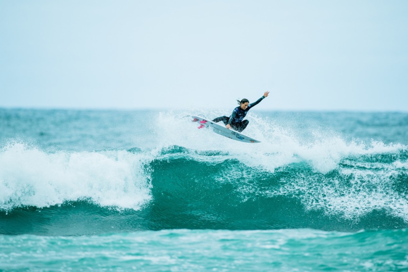 Sally Fitzgibbons rallied late to reach the quarter-finals of the WSL event at Bells Beach. 