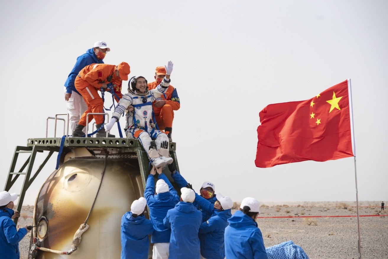 Chinese astronaut Zhai Zhigang disembarks in the Gobi Desert after the recent Shenzhou 13 mission.
