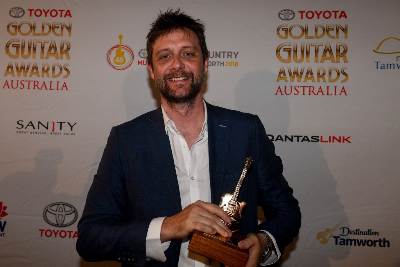 Shane Nicholson picked up four trophies at the 50th Golden Guitar Awards in Tamworth on Wednesday.