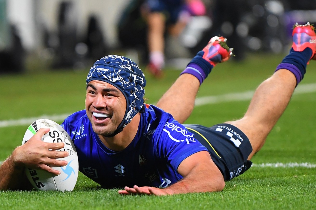 Jahrome Hughes was all smiles after a try for Storm, which humiliated the Warriors 70-10.