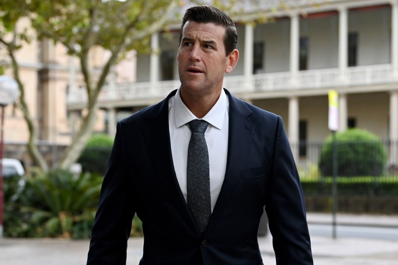 One of the witnesses testifying for Ben Roberts-Smith is accused of attacking a police officer.