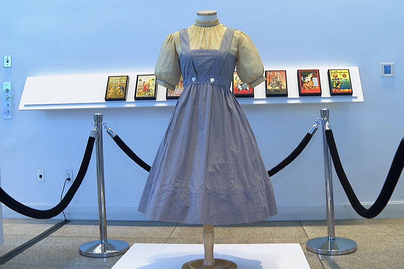 A gingham dress worn by Judy Garland in The Wizard of Oz is expected to fetch up to $1.7m at auction