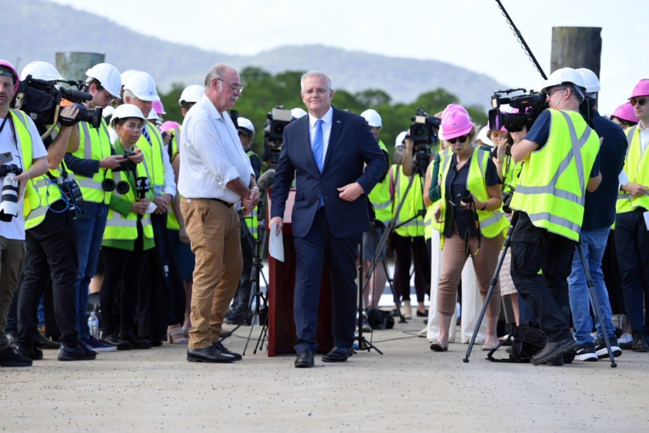 Mr Morrison began Thursday campaigning in Cairns, with Coalition MP Warren Entsch.