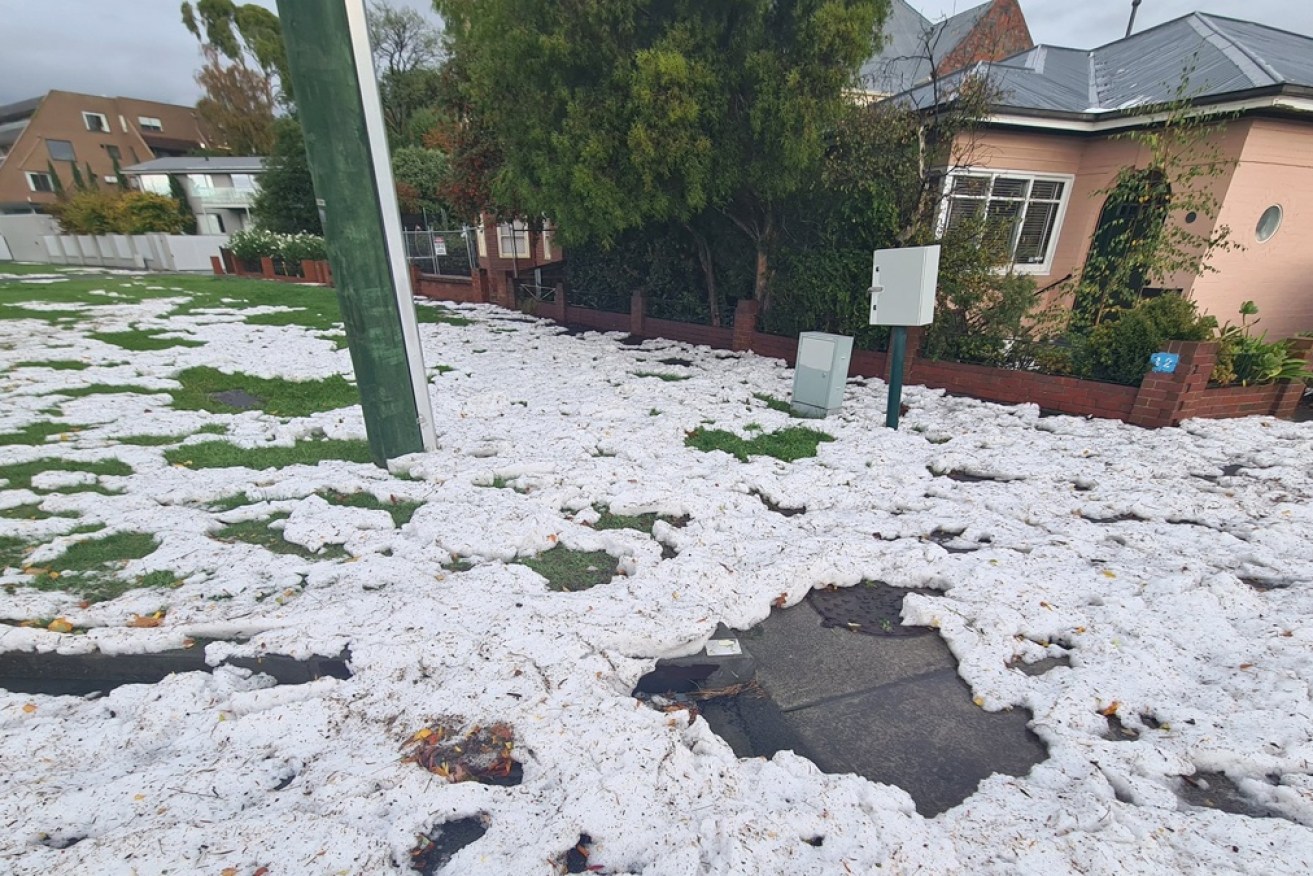 Hobart has been hit by heavy rain and hail, in wild storms.