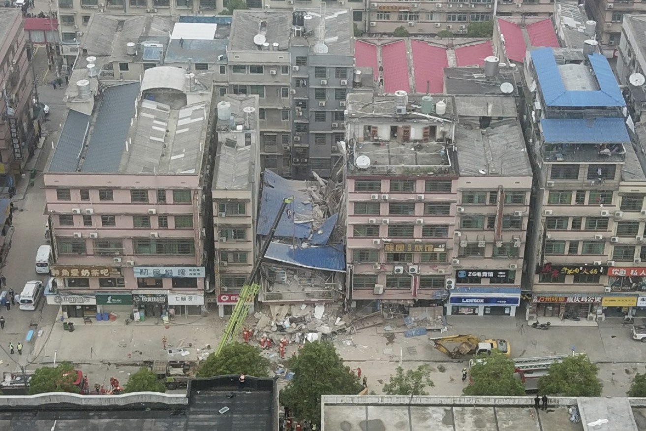 A housing block that collapsed in China left 53 people dead, according to state media.