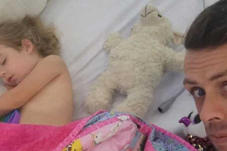 Qld toddler left on bus wakes in hospital