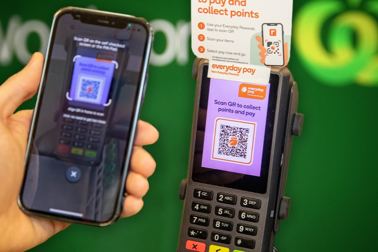 Experts say Woolworths won't be the last major retailer to adopt QR code payments. 