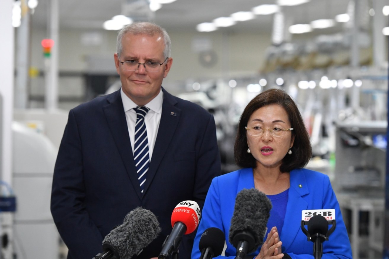 Mr Morrison with Chisholm MP Gladys Liu at a Melbourne manufacturing plant on Friday.