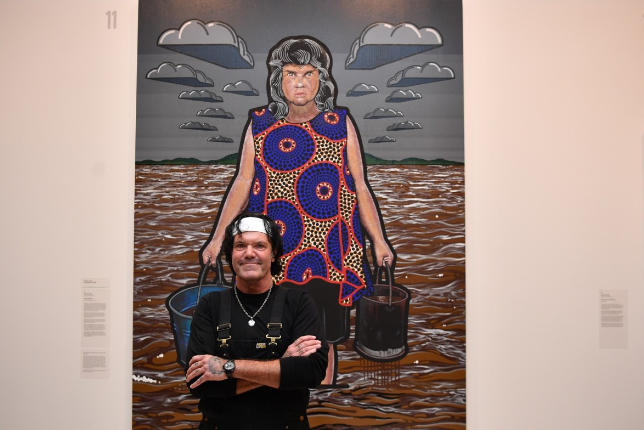 Indigenous artist Blak Douglas has won the 2022 Archibald Prize with a portrait of Karla Dickens.