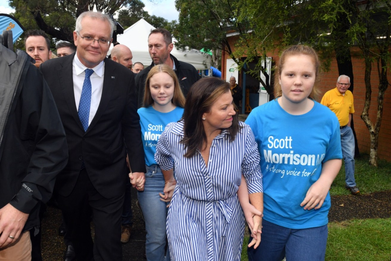 Scott Morrison arrives with his family to vote at Lilli Pilli Public School in the NSW seat of Cook.