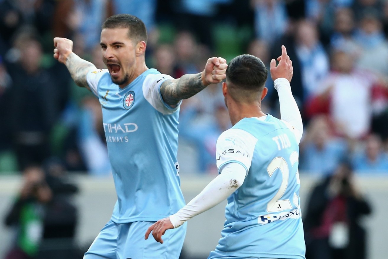 Jamie Maclaren and Marco Tilio both scored as Melbourne City advanced to the grand final on Sunday. 